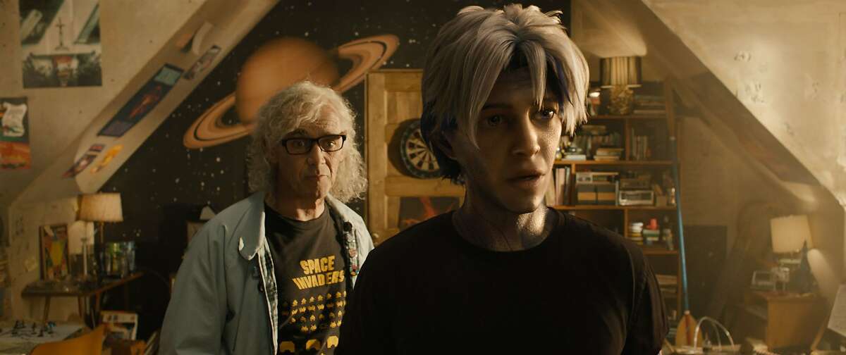 Mark Rylance,, left, as Halliday, and Tye Sheridan (augmented by special effects) as Parzival in "Ready Player One."
