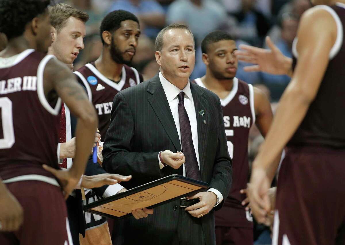 PHOTOS: Top college football coaching candidates  Texas A&M head coach Billy Kennedy, center, talks with his team during the first half of a second-round game against North Carolina in the NCAA men's college basketball tournament in Charlotte, N.C., Sunday, March 18, 2018. (AP Photo/Gerry Broome)  >>>Here's a look at the top college football coaching candidates ... 
