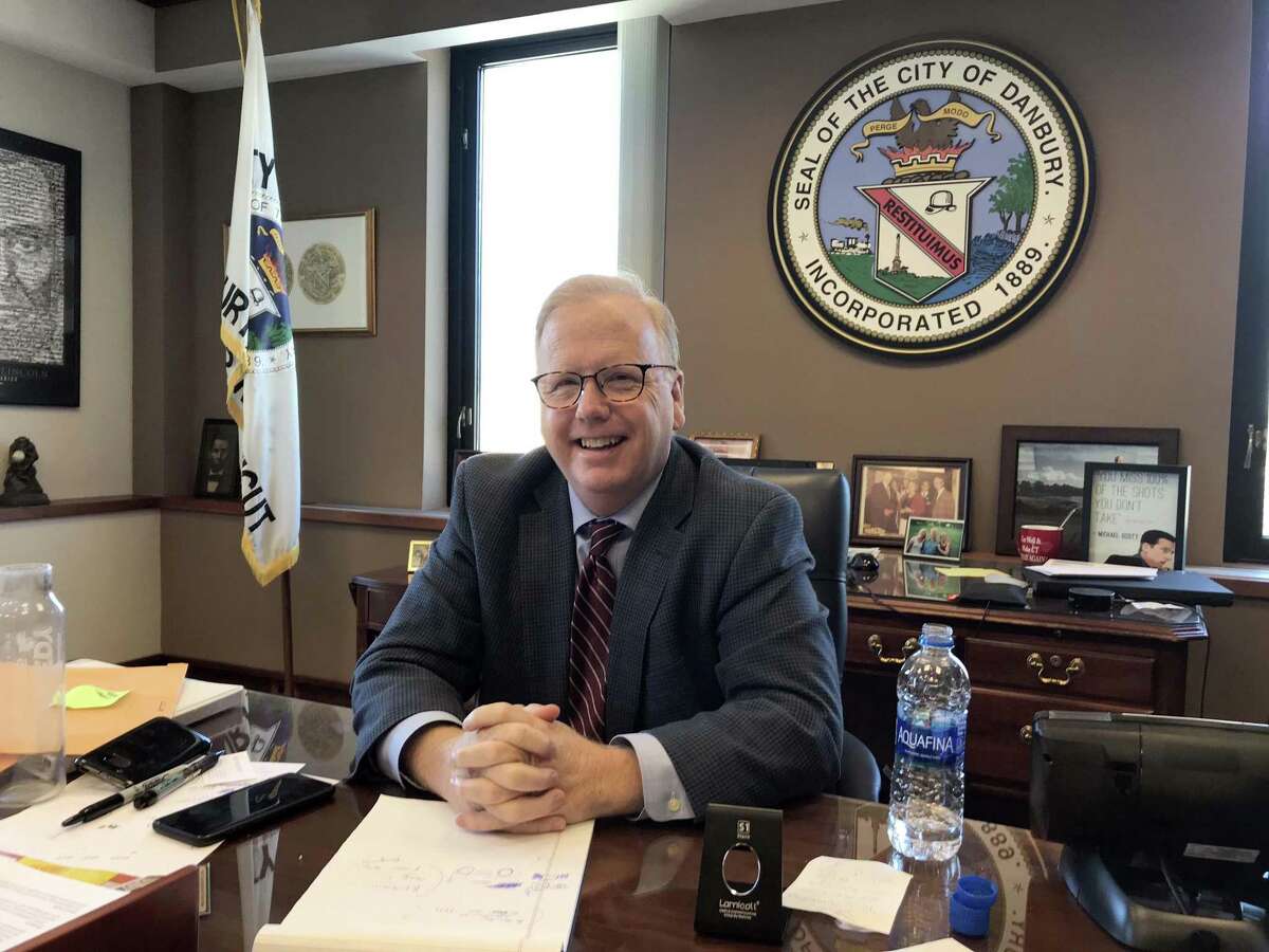 Danbury Mayor Mark Boughton returned to work at City Hall on Monday, after suffering a medical episode late last week at an event for Republican candidates for governor.