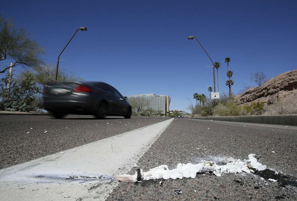 The scene near where a pedestrian was stuck and killed by an Uber vehicle in autonomous mode in Tempe, Ariz. Uber has lost its self-driving permit in California.