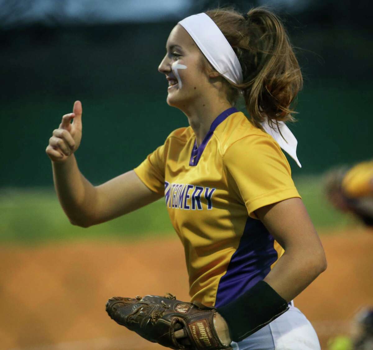 Montgomery's Maggie Hendrix (9) takes the field during the softball game against College Park on Friday, March 9, 2018, at Montgomery High School. (Michael Minasi / Houston Chronicle)