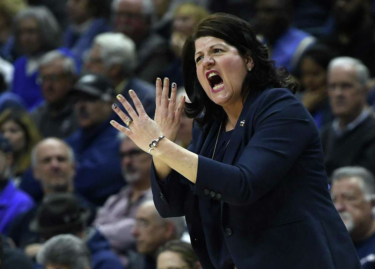 Quinnipiaccoach Tricia Fabbri gestures during the first half a second-round game against UConn on Monday in Storrs.