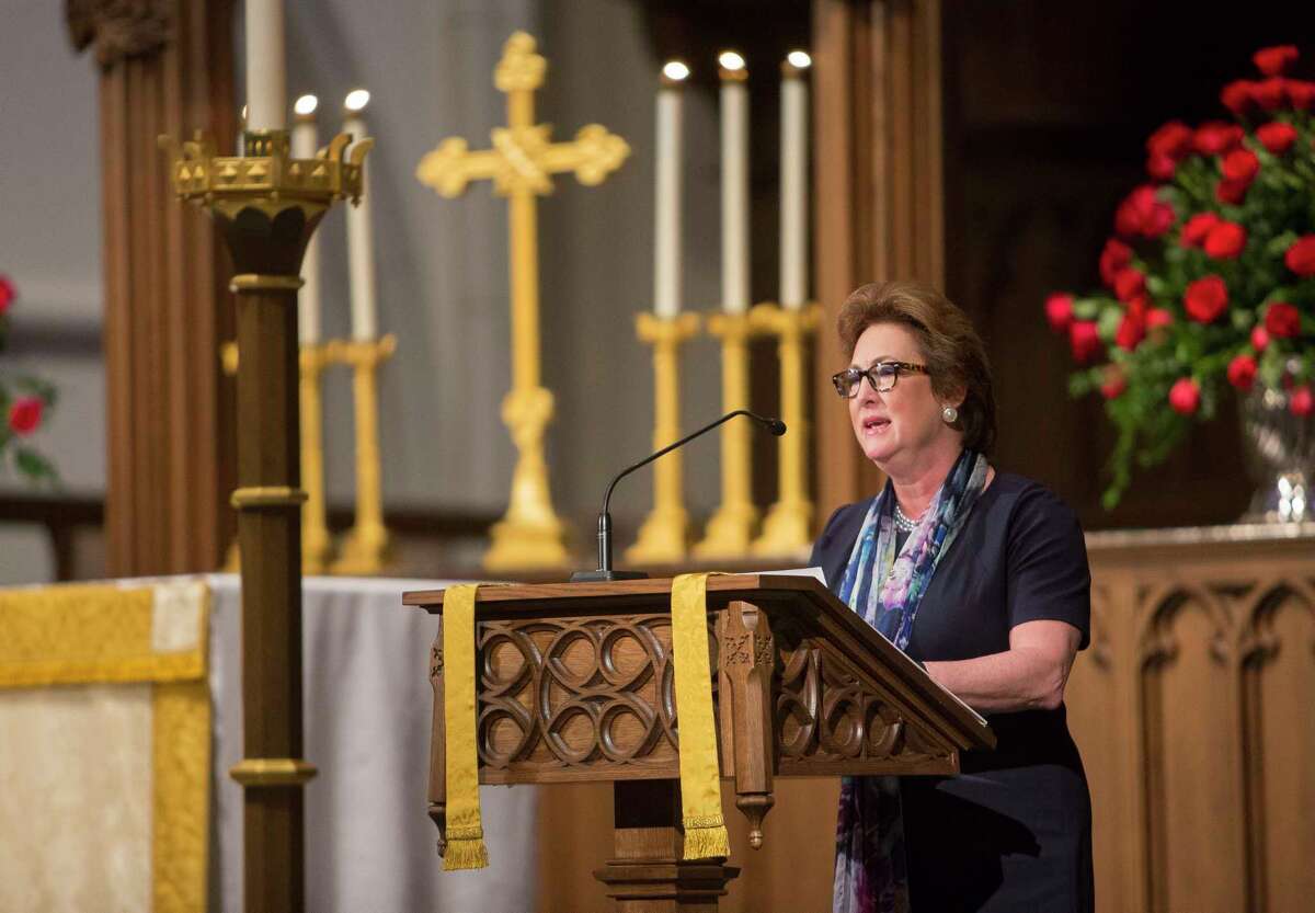 Kim Ogg reads from the Book of Isaiah during a memorial service for her father, former Texas State Senator Jack C. Ogg, at St. Martin's Episcopal Church, Monday, March 19, 2018, in Houston.