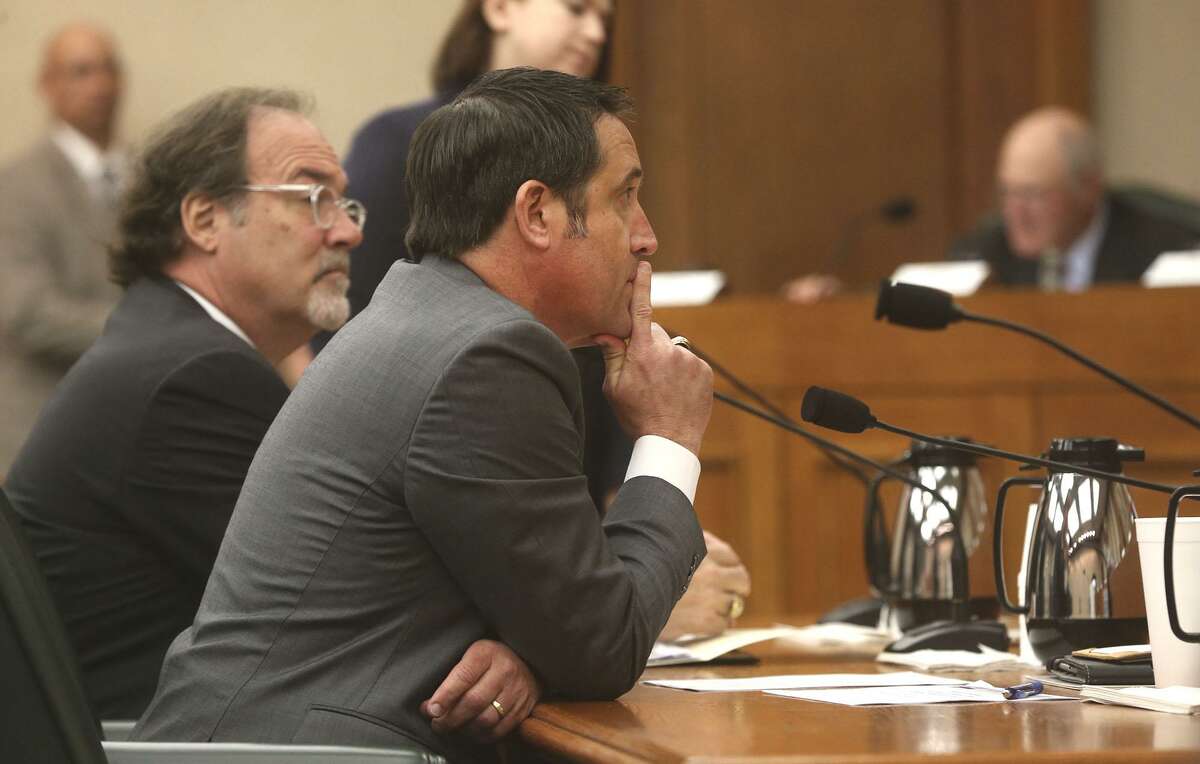 Glenn Hegar (foreground), Comptroller, Texas Comptroller of Public Accounts, listens Tuesday March 20, 2018 at the Texas State Capitol in Austin. He testified to the Senate Finance Committee about a proposal to invest the rainy day fund in items that may yield better returns than the current investment plan.