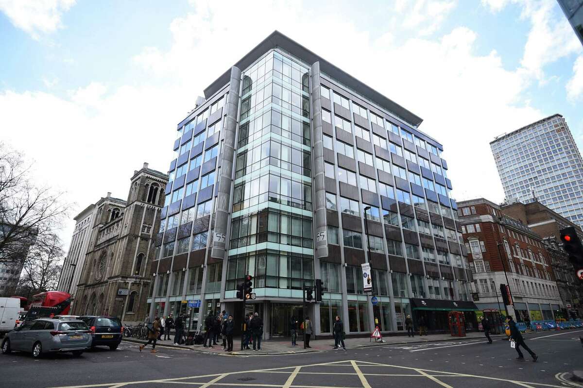 The offices of Cambridge Analytica (CA) in central London, after it was announced that Britain's information commissioner Elizabeth Denham is pursuing a warrant to search Cambridge Analytica's computer servers, Tuesday March 20, 2018. Denham said Tuesday that she is using all her legal powers to investigate Facebook and political campaign consultants Cambridge Analytica over the alleged misuse of millions of people's data. Cambridge Analytica said it is committed to helping the U.K. investigation. (Kirsty O'Connor/PA via AP)