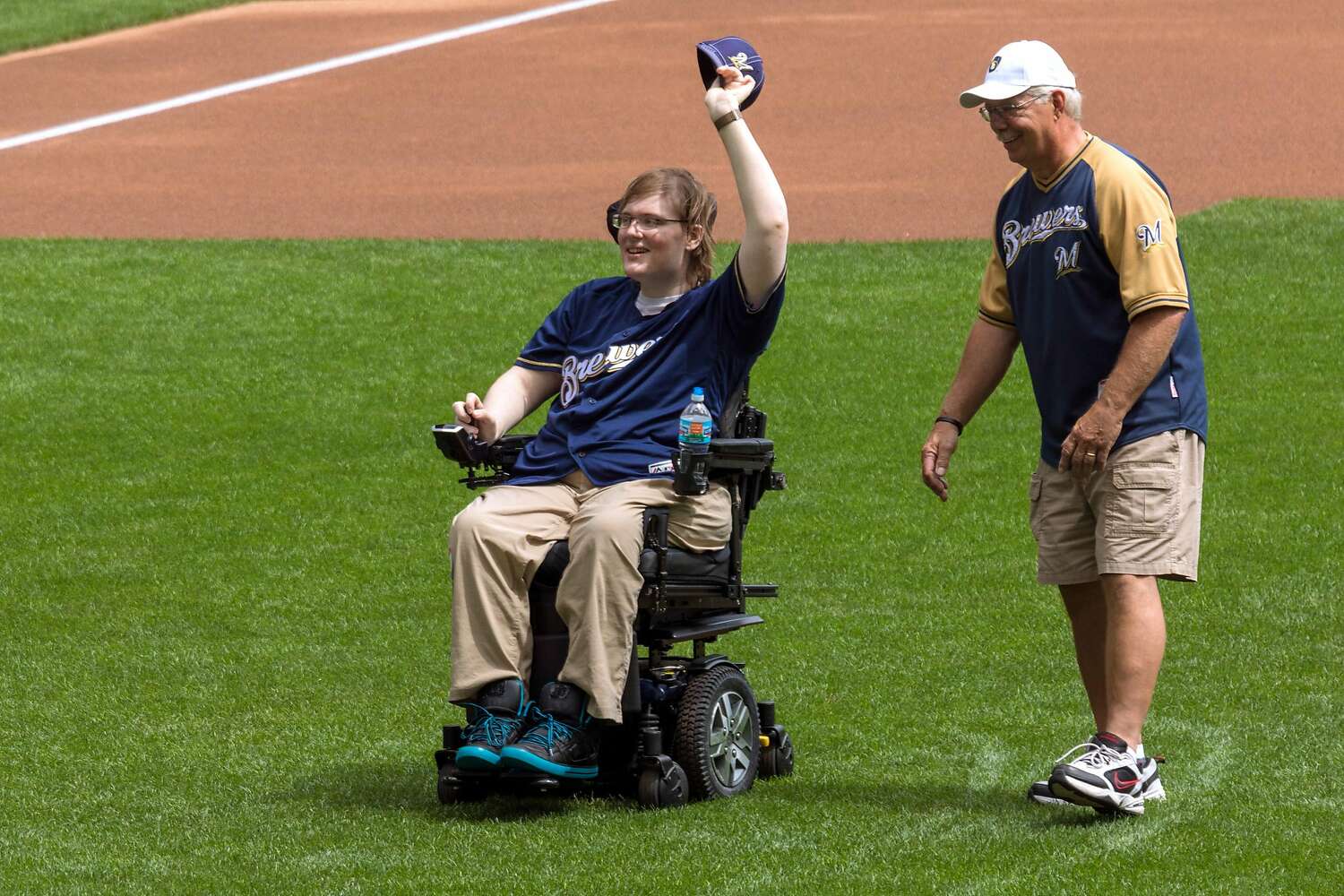 Lucas Lindner after throwing the first pitch in a baseball game.
