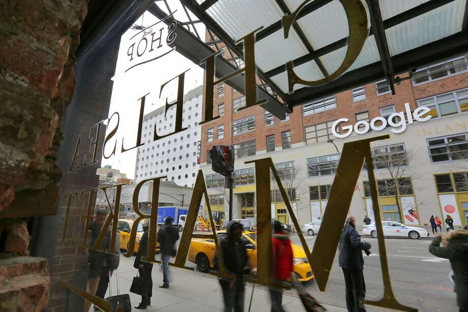   The Chelsea Market Building Window Sign and Signs to Google's Main Station in New York City are shown in this photo, Tuesday, March 20, 201[ads1]8. Photo: Richard Drew, Associated Press 