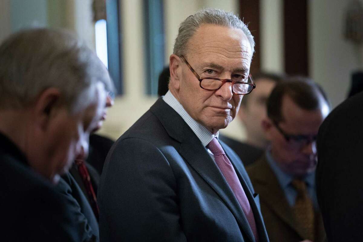 Senate Minority Leader Chuck Schumer (D-N.Y.) speaks following a weekly policy luncheon on Capitol Hill in Washington, March 20, 2018.