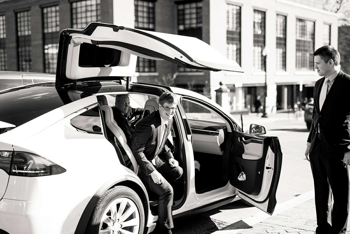 Alexi Hoeft and Alexander Hart of Washington, D.C. get married, adding in bits of the couple's love of Tesla throughout the ceremony and reception.