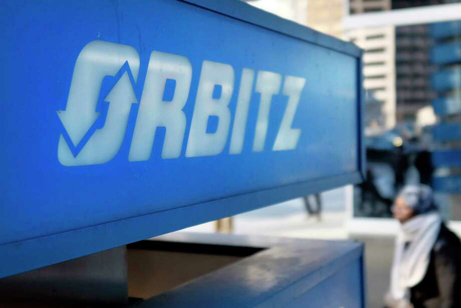 FILE - This Feb. 12, 2015 file photo shows signage for travel booking site Orbitz outside the building that houses its headquarters, in Chicago. Orbitz says a legacy travel booking platform may have been hacked, potentially exposing the personal information of people that made purchases between Jan. 1, 2016 and Dec. 22, 2017. The company said Tuesday, March 20, 2018, about 880,000 payment cards were impacted. (AP Photo/Kiichiro Sato, File) Photo: Kiichiro Sato / Copyright 2018 The Associated Press. All rights reserved.