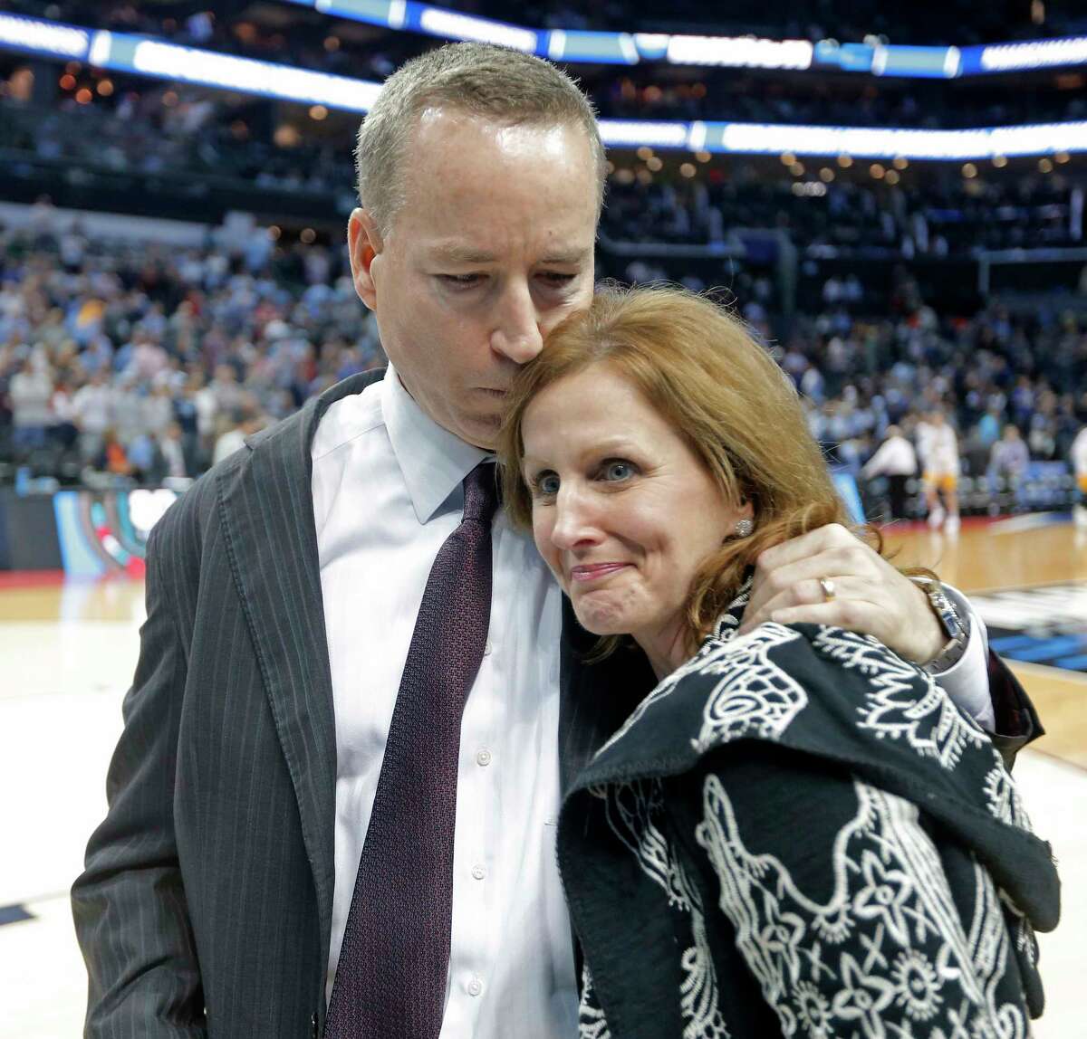 Texas A&M coach Billy Kennedy and his wife, Mary, enjoy the Aggies' victory over North Carolina on Sunday.