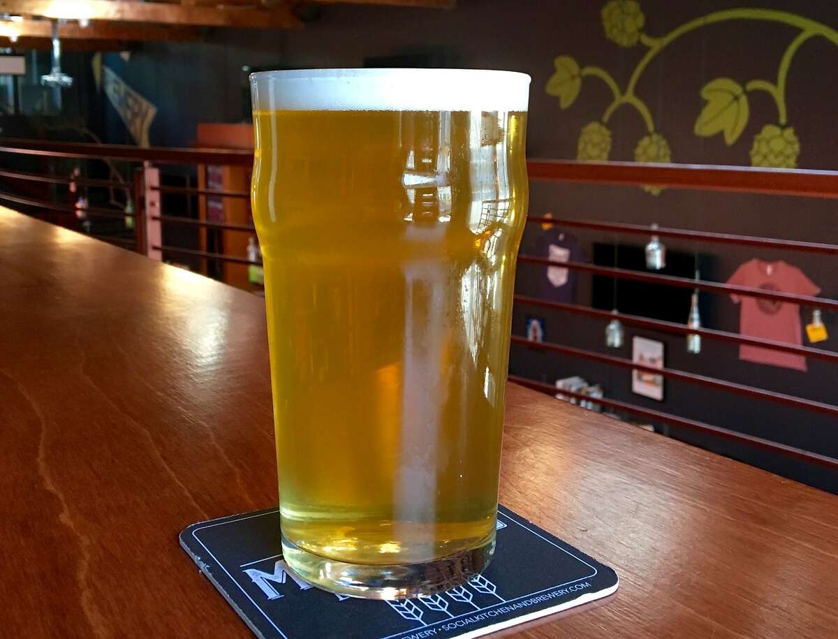 Social Brewing's Kim Sturdavant is widely credited with pioneering the beer style. Pictured is one of its brut IPAs, Puttin' on the Spritz.