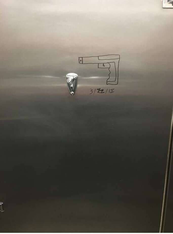 This was the drawing found on March 20. Delta College Public Safety was made aware of a concerning drawing located inside of a bathroom stall door. The drawing was located in the E – Wing Men’s bathroom. The drawing depicted an image of a handgun with numbers, letters or symbols written beneath it. Some have perceived this writing to be the date 3/22/18. (photo provided)