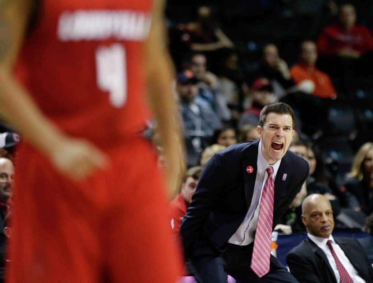 Louisville head coach David Padgett calls out to his team during the second half of an NCAA college basketball game against Florida State in the second round of the Atlantic Coast Conference tournament Wednesday, March 7, 2018, in New York. Louisville won 82-74. (AP Photo/Frank Franklin II)