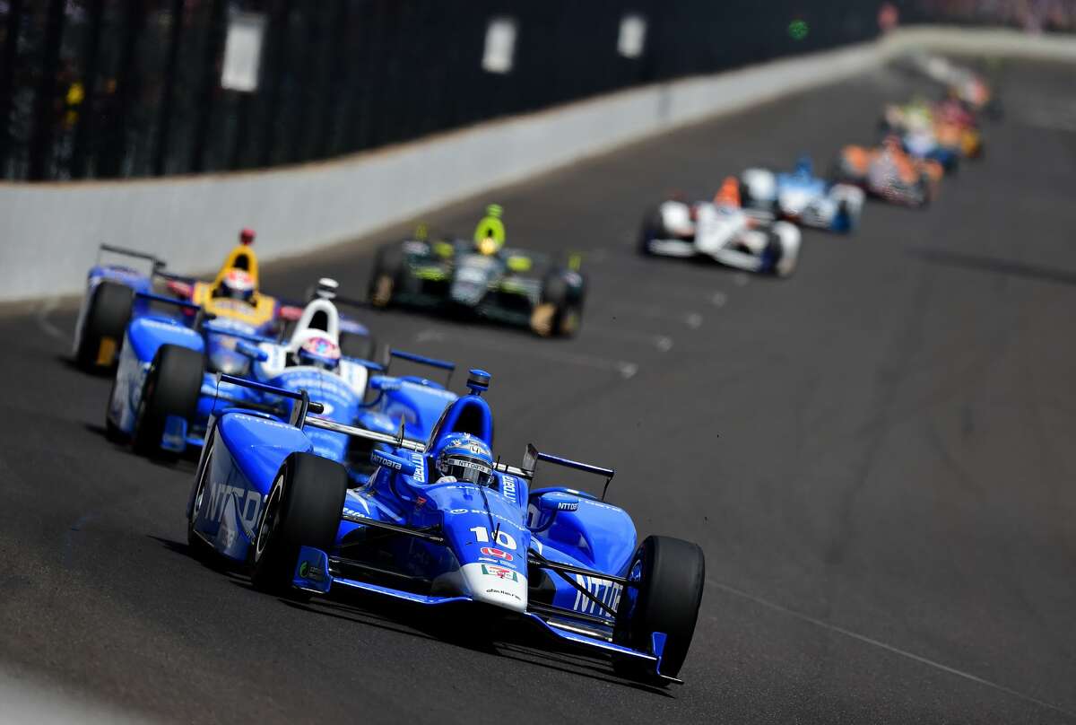 INDIANAPOLIS, IN - MAY 28: Tony Kanaan of Brazil, driver of the #10 NTT Data Honda, leads a pack of cars during the 101st Indianapolis 500 at Indianapolis Motorspeedway on May 28, 2017 in Indianapolis, Indiana. (Photo by Jared C. Tilton/Getty Images)