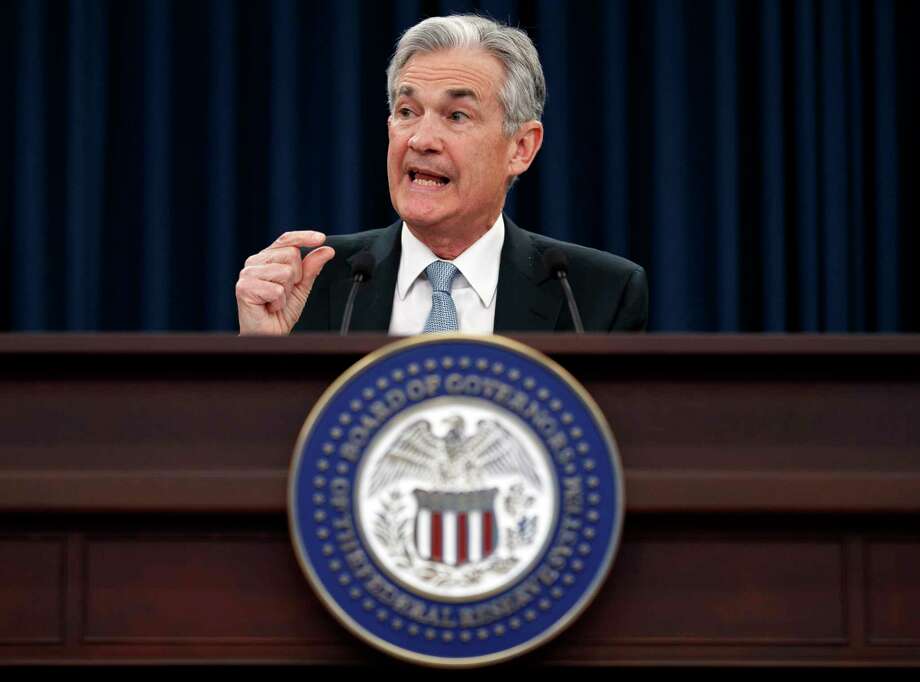 Federal Reserve Chairman Jerome Powell speaks following the Federal Open Market Committee meeting in Washington, Wednesday, March 21, 2018. The Federal Reserve is raising its benchmark interest rate to reflect a solid U.S. economy and signaling that it's sticking with a gradual approach to rate hikes for 2018 under its new chairman, Jerome Powell. (AP Photo/Carolyn Kaster) Photo: Carolyn Kaster / Copyright 2018 The Associated Press. All rights reserved.