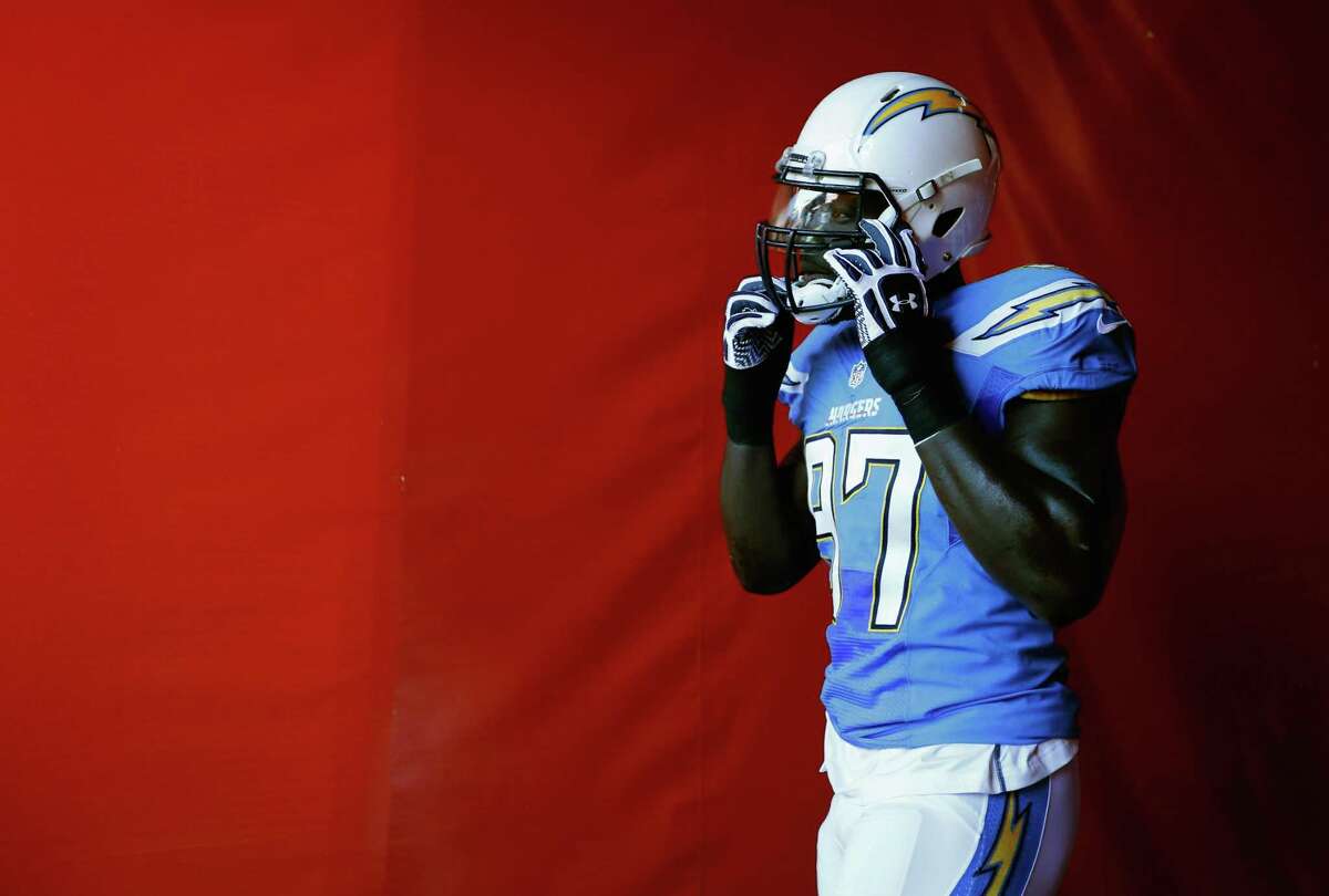Jeremiah Attaochu #97 of the San Diego Chargers enters the stadium before a game against the Kansas City Chiefs at Qualcomm Stadium on November 22, 2015 in San Diego, California.