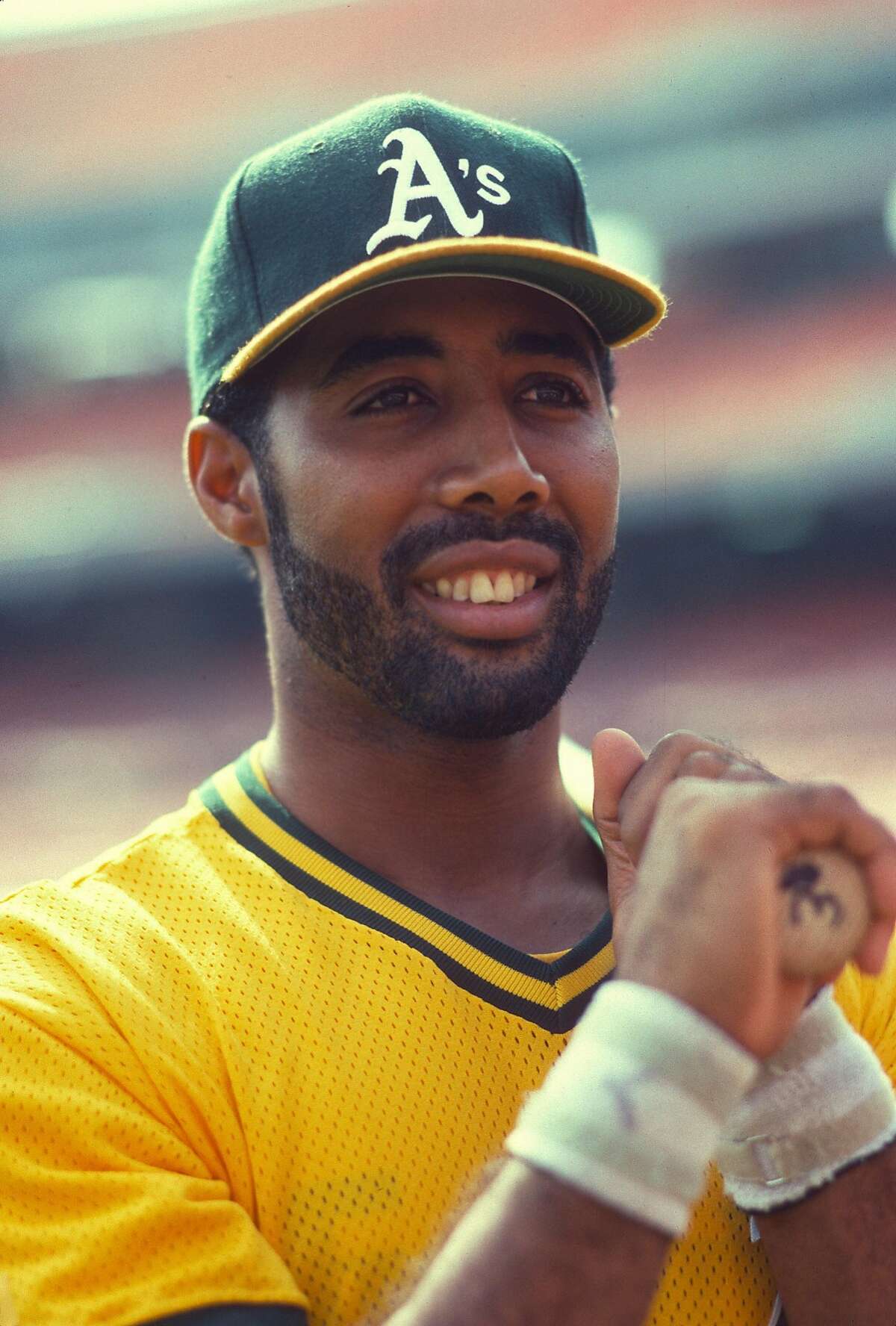 OAKLAND, CA - CIRCA 1991: Harold Baines #3 of the Oakland Athletics looks on during batting practice prior to the start of a Major League Baseball game circa 1991 at the Oakland-Alameda County Coliseum in Oakland, California. Baines played for the Athletics from 1990-92. (Photo by Focus on Sport/Getty Images)