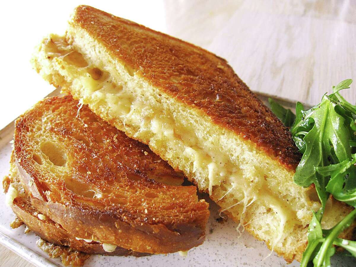 Clementine: 2195 NW Military Highway, 210-503-5121. Kida's Grilled Cheese is served on sourdough with white cheddar and Barely Buzzed cheese with a side salad.