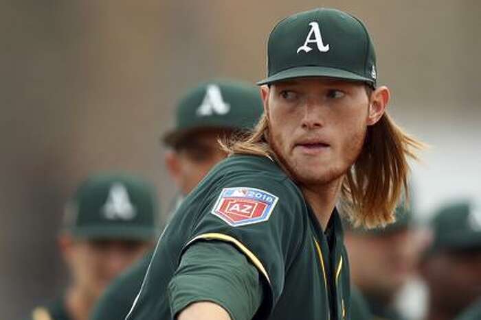 A.J. Puk cut off his hair, but Daniel Mengden's mustache is back