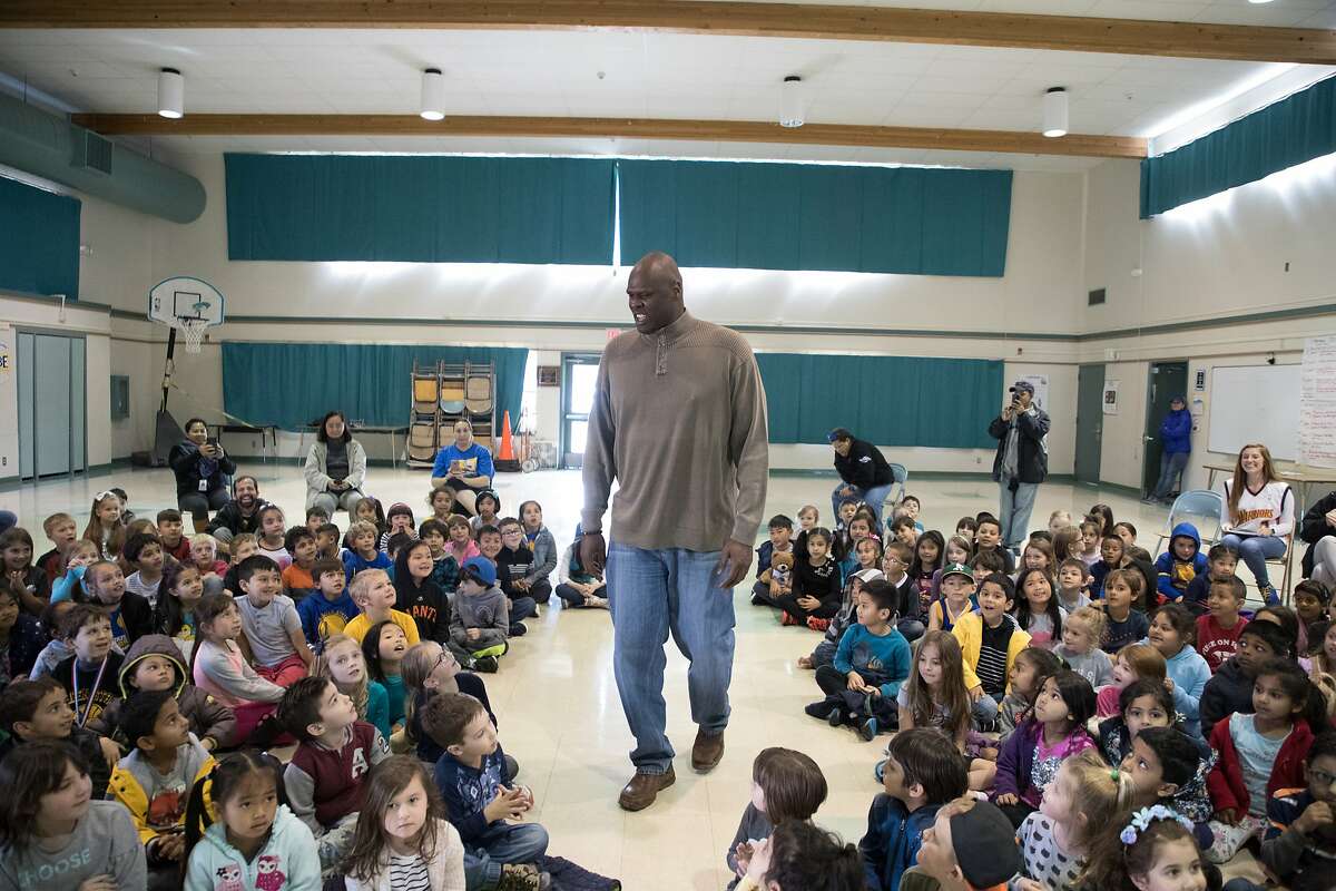 Adonal Foyle, 6'10", arrives at an elementary school on Thursday, March 22, 2018 in Concord, CA.