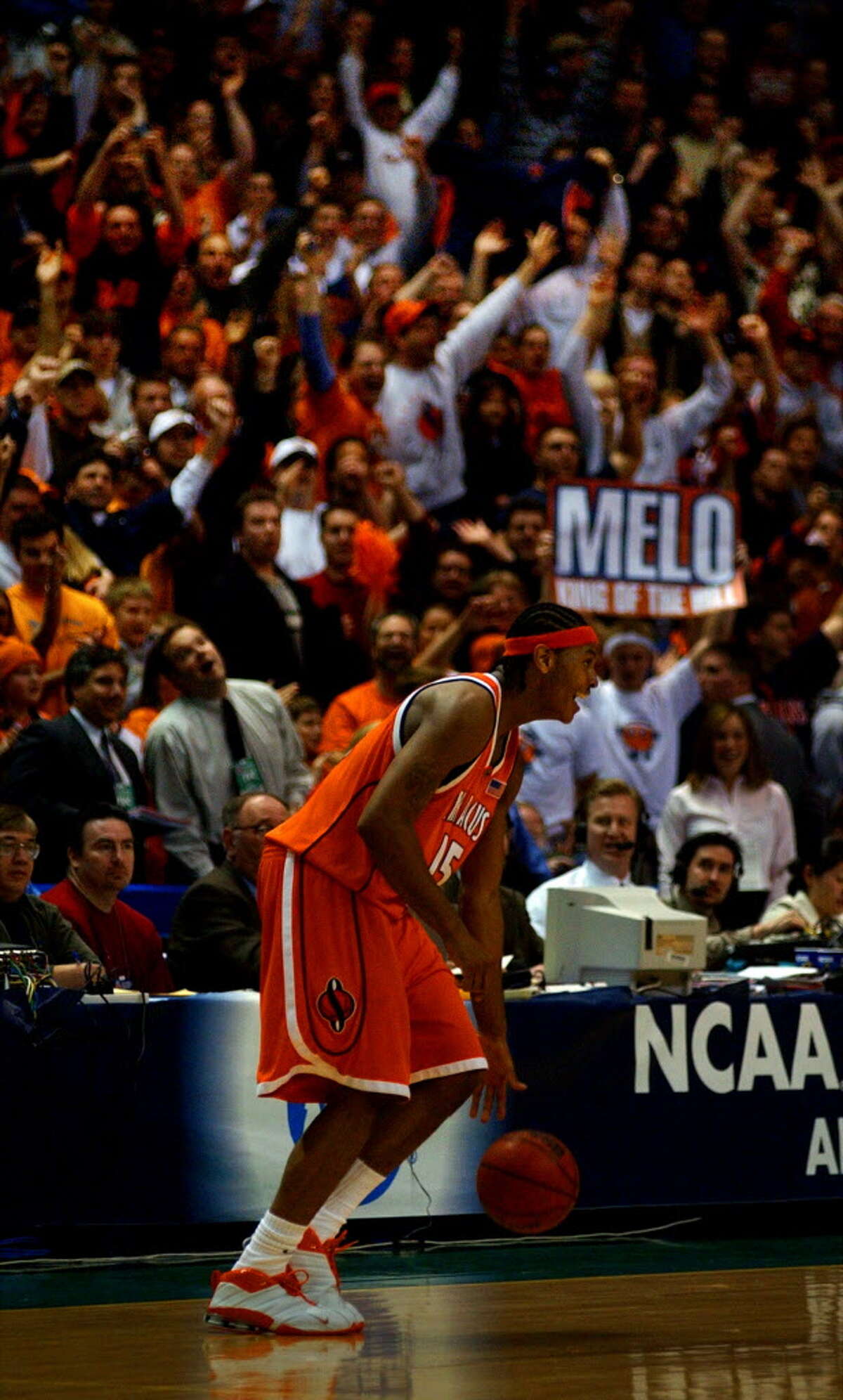 Times Union Staff photograph by Philip Kamrass -- Syracuse University forward Carmelo Anthony dribbles out the clock during the final seconds of his team's 63-47 victory over Oklahoma in the NCAA East Regional at the Pepsi Arena in Albany, NY Sunday March 30, 2003. Anthony was named MVP.