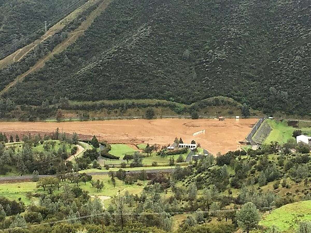 Moccasin Reservoir Dam in the Sierra foothills on Wednesday. Officials warned the dam is in imminent danger of failing.