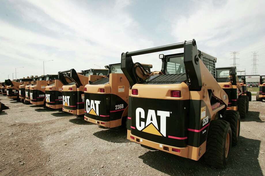 FILE - JULY 24: According to reports on July 24, 2014, Caterpillar Inc reported higher second quarter profits than were expected, but posted lower sales in the global market, offsetting a rebound in North America. ELMHURST, ILLINOIS - APRIL 24:  Caterpillar earth moving equipment is displayed at Patten Industries on April 24, 2006 in Elmhurst, Illinois. Heavy equipment maker Caterpillar reported first-quarter earnings higher than forecasted at $840 million, up 45 percent from $581 million during the same period in 2005. (Photo by Scott Olson/Getty Images) ORG XMIT: 57408379 Photo: Scott Olson / 2006 Getty Images