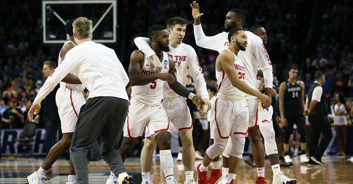 White, Grimes lead No. 21 Houston to 64-57 win over Memphis