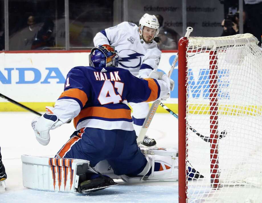 NEW YORK, NY - MARCH 22: J.T. Miller #10 of the Tampa Bay Lightning is stopped by Jaroslav Halak #41 of the New York Islanders during the third period at the Barclays Center on March 22, 2018 in the Brooklyn borough of New York City. The Lightning defeated the Islanders 7-6. (Photo by Bruce Bennett/Getty Images) Photo: Bruce Bennett / 2018 Getty Images