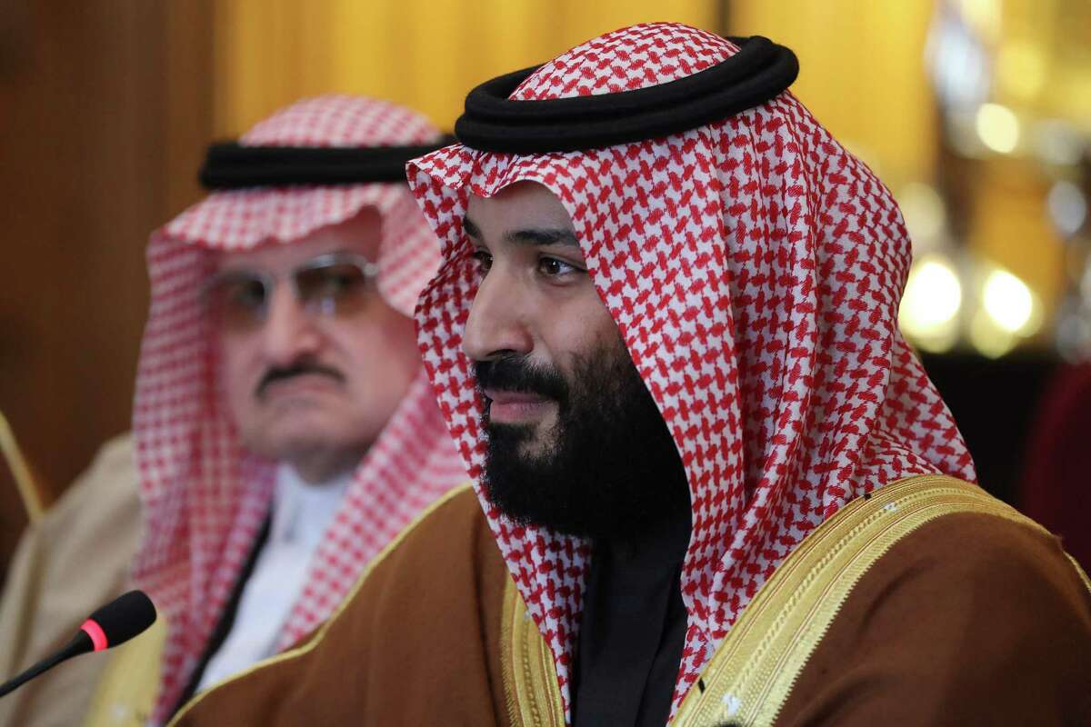 Saudi Arabia's Crown Prince Mohammed bin Salman (R) gestures during a meeting with Britain's Prime Minister Theresa May (unseen) and other members of the British government and Saudi ministers and delegates at number 10 Downing Street, in central London. Likening Iran's leader to Adolf Hitler, Saudi Arabia's crown prince warned in a US television interview that if Tehran gets a nuclear weapon, his country will follow suit. "Saudi Arabia does not want to acquire any nuclear bomb, but without a doubt, if Iran developed a nuclear bomb, we will follow suit as soon as possible," Saudi Crown Prince Mohammed bin Salman said in an excerpt of the interview that aired March 15, 2018 on "CBS This Morning."The 32-year-old Prince Mohammed said he has referred to Iran's supreme leader Ayatollah Ali Khamenei as "the new Hitler" because "he wants to expand." 