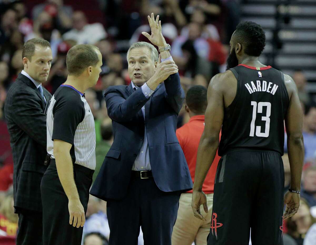 Houston Rockets head coach Mike D'Antoni tries to explain to official John Goble (30) how Houston Rockets guard James Harden (13) was fouled while putting up a shot to end the third quarter against the Detroit Pistons at Toyota Center on Thursday, March 22, 2018, in Houston. Rockets won the game 100-96 in overtime.