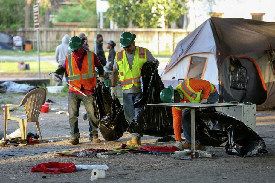 City cleans Midtown homeless camp Houston Chronicle