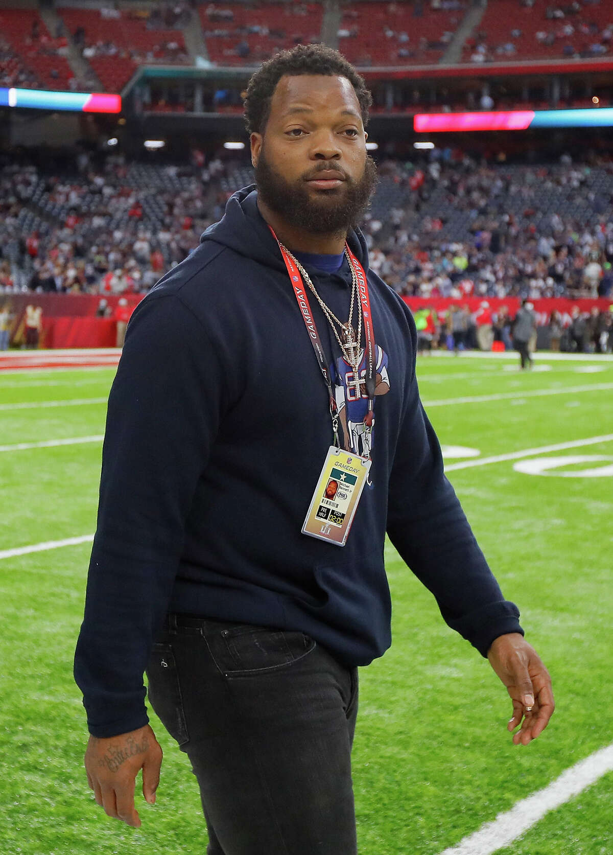 Michael Bennett Jr. of the Seattle Seahawks walks on the sideline before Super Bowl LI between the New England Patriots and the Atlanta Falcons at NRG Stadium on February 5, 2017 in Houston, Texas.