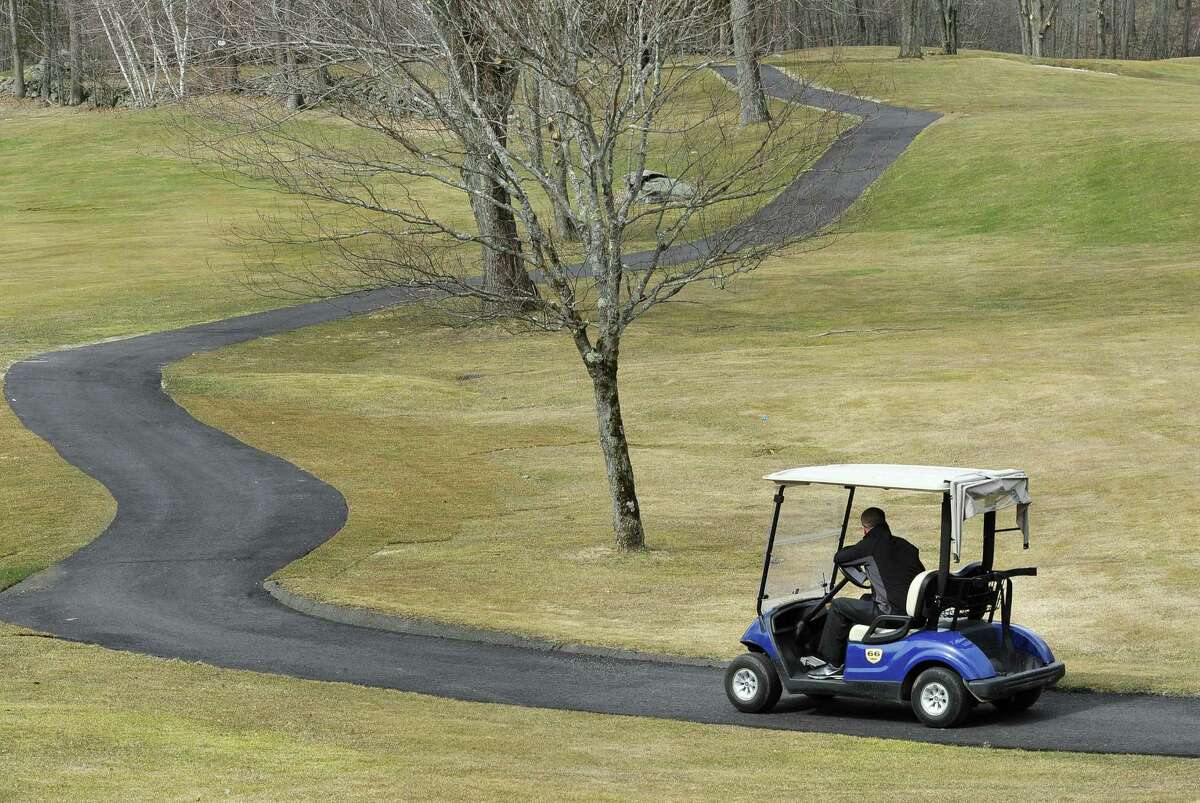 A new cart path, as seen from the 10th tee, is one of the improvements at the Richter Park Golf Course in Danbury, Conn. Thursday, March 28, 2013.