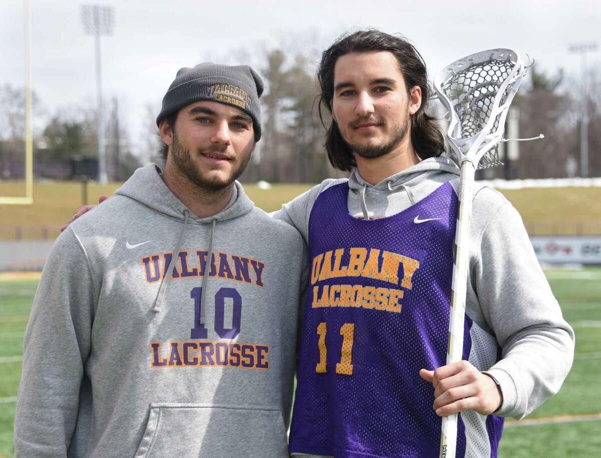 University at Albany lacrosse twin brothers Troy Reh, left, and Justin Reh are seen after practice on Friday, March 23, 2018 in Albany, N.Y. (Lori Van Buren/Times Union)