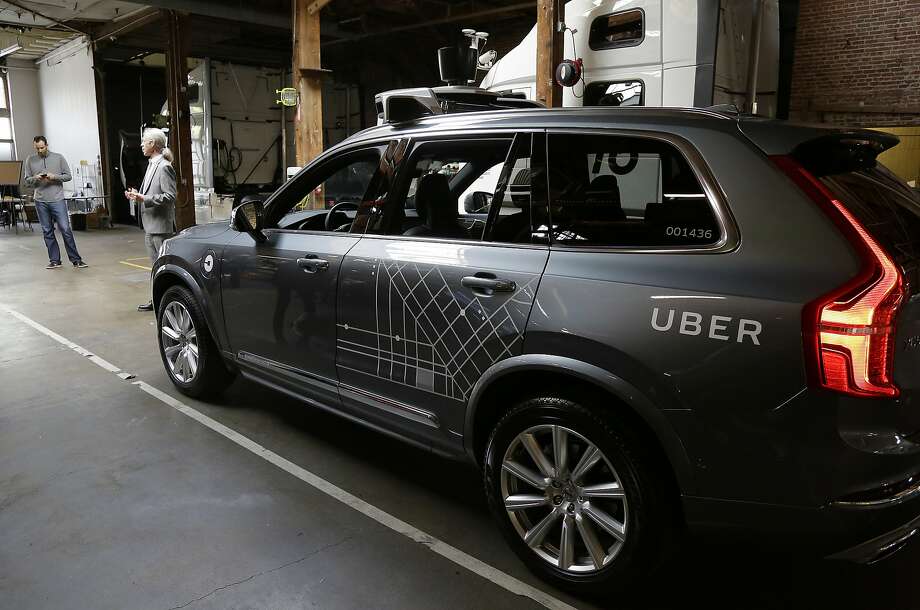 an uber driverless car is displayed in a garage in san francisco
