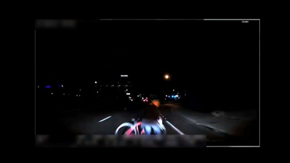 This video grab made from dashcam footage released by the Tempe Police Department on March 21, 2018 shows the moment before the collision of ride-sharing Uber's self-driving vehicle and a pedestrian in the city of Tempe, Arizona on March 18, 2018.