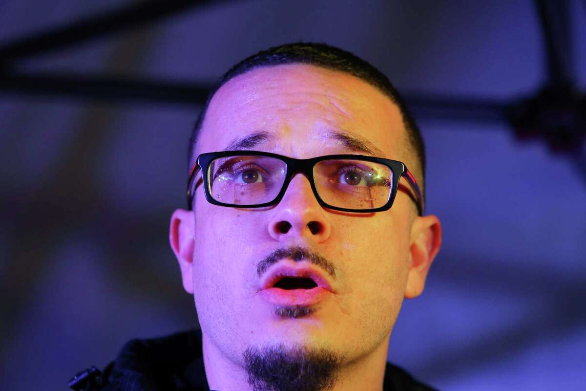 "Seattle is setting the tone for the country," says activist and New York Daily News journalist Shaun King as he speaks to the crowd during a rally for women's rights on International Women's Day, Wednesday, March 8, 2017, at Westlake Park. (Genna Martin, seattlepi.com)