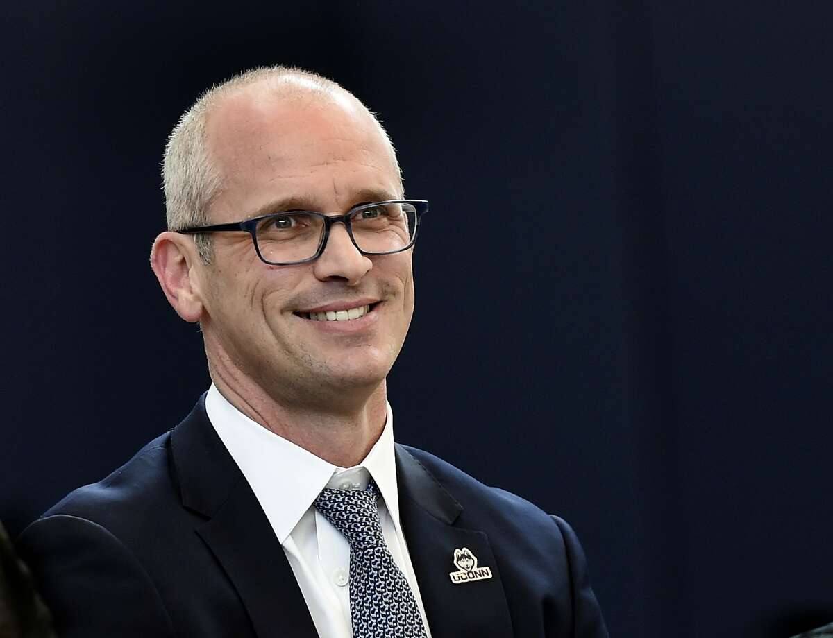 Dan Hurley smiles during an introductory press conference at the University of Connecticut in Storrs, Conn., Friday, March 23, 2018. Hurley was named head coach of the men's NCAA college basketball team. (AP Photo/Stephen Dunn)
