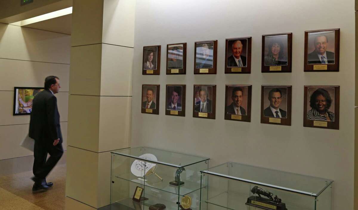 Roland Mower’s portrait is seen (top row, right) as the board of directors Friday described the qualities sought in his successor.