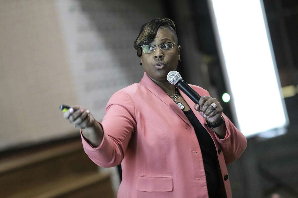 Chief Academic Officer Grenita Lathan points to a slide during a community meeting at Worthing High School as part of a series of meetings HISD held ahead of next month's planned vote to hand over control of several schools on Wednesday, March 21, 2018, in Houston. ( Elizabeth Conley / Houston Chronicle )