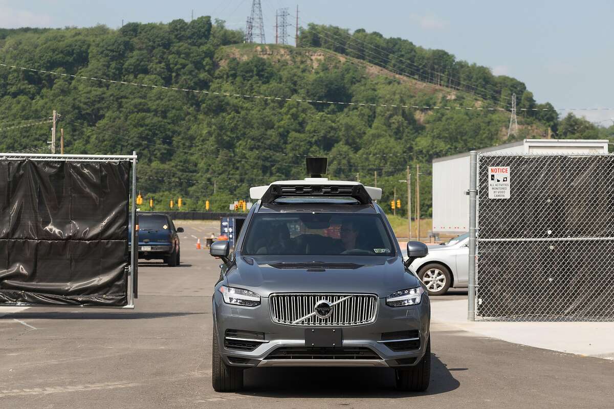  An Uber self-driving car navigating a test site in Pittsburgh's Hazelwood neighborhood, May 11 2017. Uber's robotic vehicle project was not living up to expectations months before a self-driving car operated by the company struck and killed a woman in Arizona in March 2018.