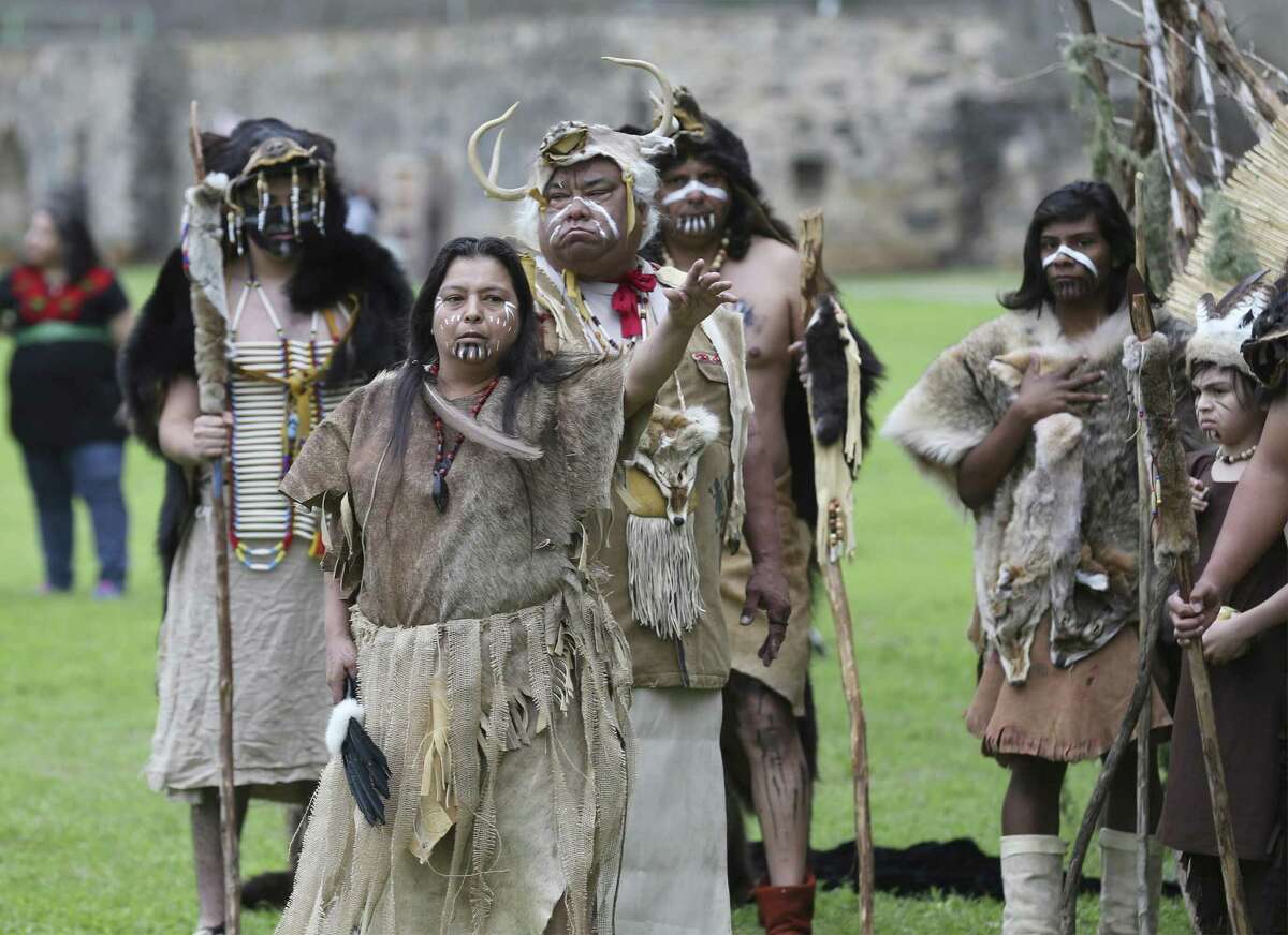 Arlene Lopez (foreground) and others act in a play at the Tricentennial Founders' Feast Day, which commemorated the March 5, 1731, Acto de Posesión, when the Franciscan priests handed over ownership of Missions Concepción, San Juan Capistrano and Espada to the Native American families residing there.
