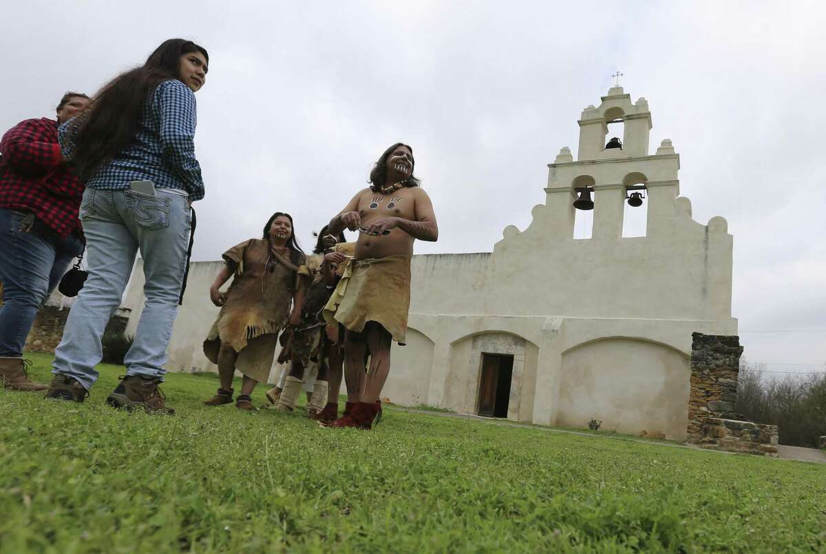 Jose Lopez (center) with his, Arlene, and his sons wear period clothing for a play at the Tricentennial Founders' Feast Day, which commemorates the March 5, 1731, Acto de Posesión, when the Franciscan priests handed over ownership of Missions Concepción, San Juan Capistrano and Espada to the Native American families residing there.