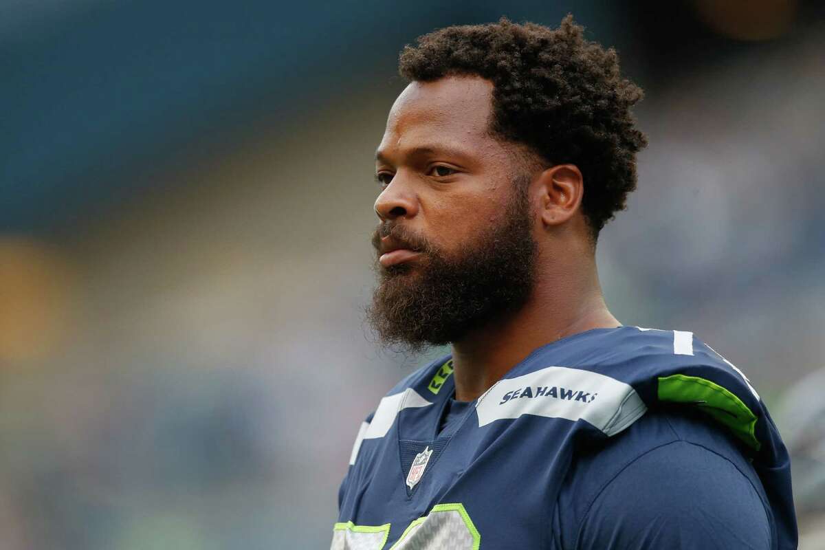 SEATTLE, WA - AUGUST 18: Defensive end Michael Bennett #72 of the Seattle Seahawks looks on prior to the game against the Minnesota Vikings at CenturyLink Field on August 18, 2017 in Seattle, Washington. (Photo by Otto Greule Jr/Getty Images)