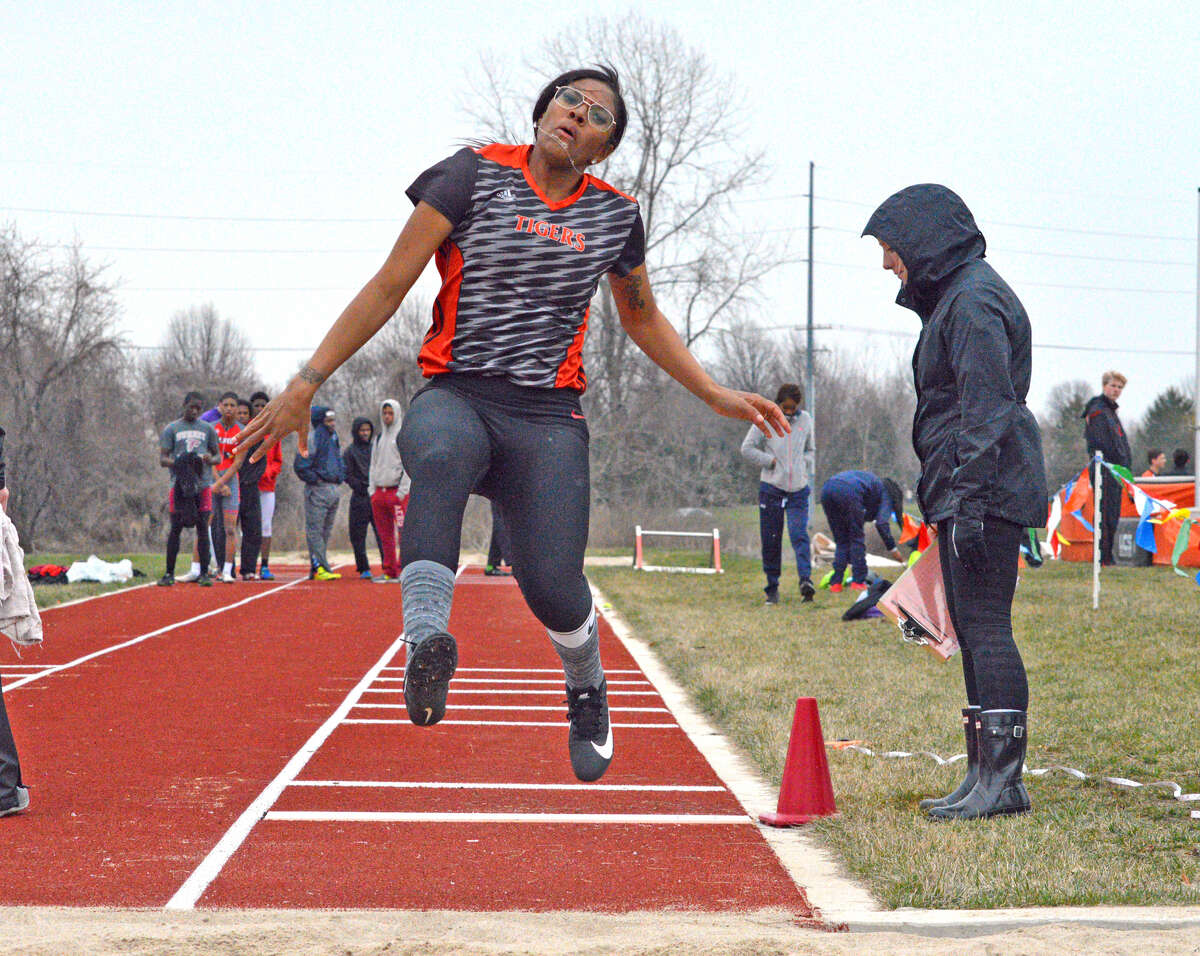 Edwardsville’s Kyra Conner competes in the long jump.