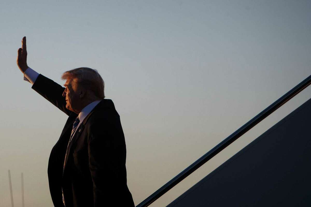 President Donald Trump arrives aboard Air Force One, at Palm Beach International Airport in West Palm Beach, Fla., March 23, 2018. As Trump headed to his Mar-a-Lago resort after a particularly tumultuous week, officials at the White House and in Congress were equally mystified about what might come next. (Tom Brenner/The New York Times)