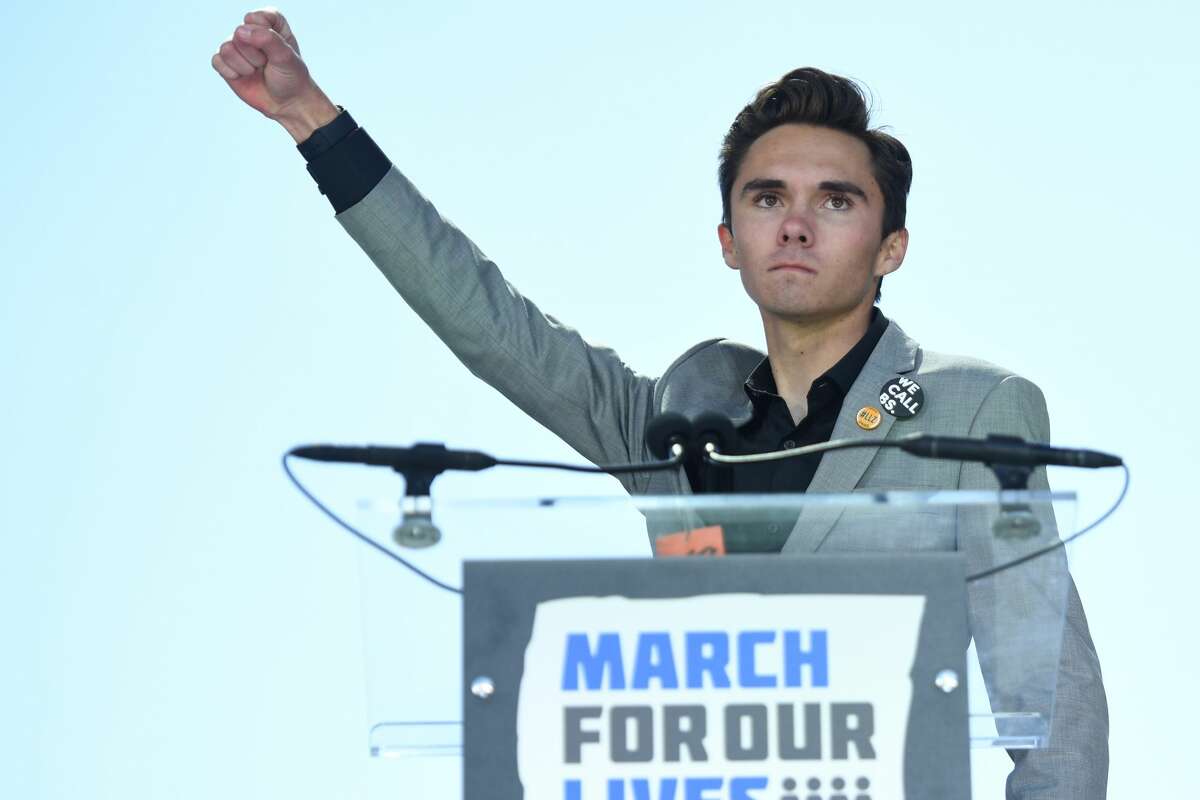 Marjory Stoneman Douglas High School student David Hogg adresses the crowd during the March For Our Lives rally against gun violence in Washington, DC on March 24, 2018. Galvanized by a massacre at a Florida high school, hundreds of thousands of Americans are expected to take to the streets in cities across the United States on Saturday in the biggest protest for gun control in a generation. / AFP PHOTO / JIM WATSON