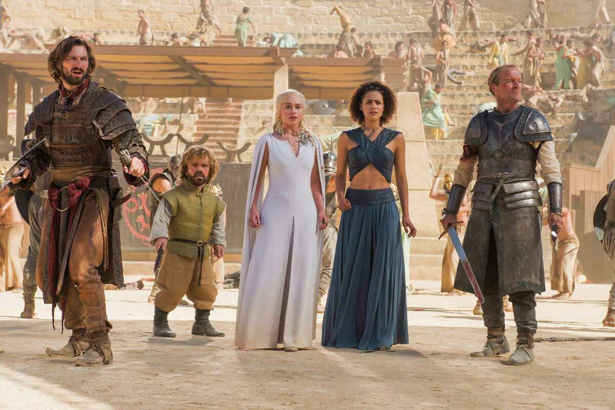 Michiel Huisman, from left, Peter Dinklage, Emilia Clarke, Nathalie Emmanuel and Iain Glen star in "Game of Thrones."